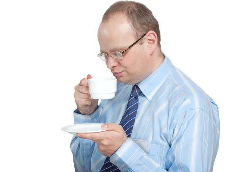 Young man with glasses drinking tea isolated on white background