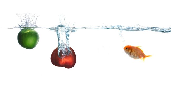 An image of fruit and golden fish