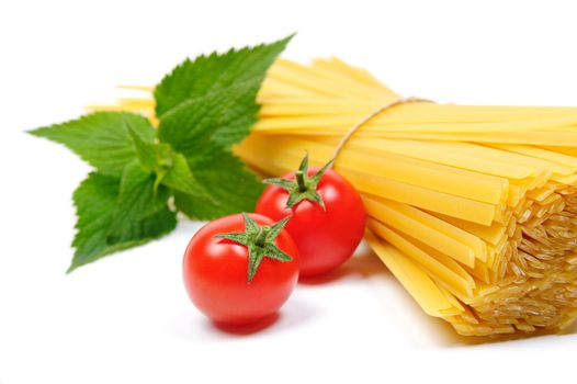 An image of two red tomatoes and pasta