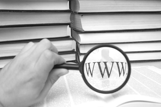An image of magnifier with lettering "WWW"