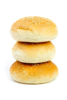 An image of three fresh buns on white background