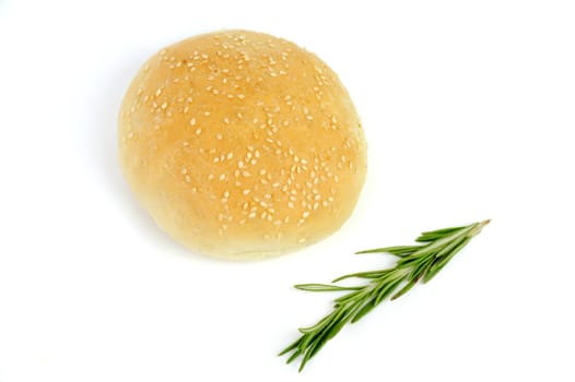 An image of a fresh bun and rosemary