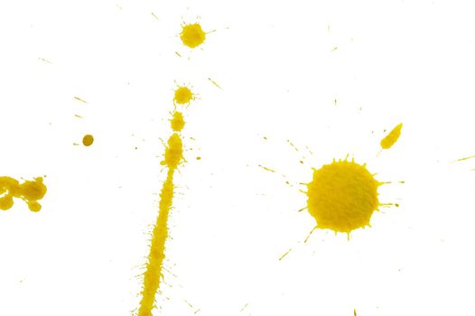 An image of yellow spots on white paper