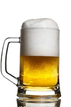 Bubbling light lager in a glass keg isolated on white