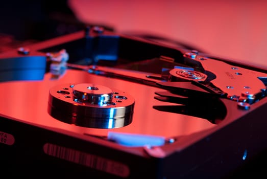 Hard drive closeup on a under a red light