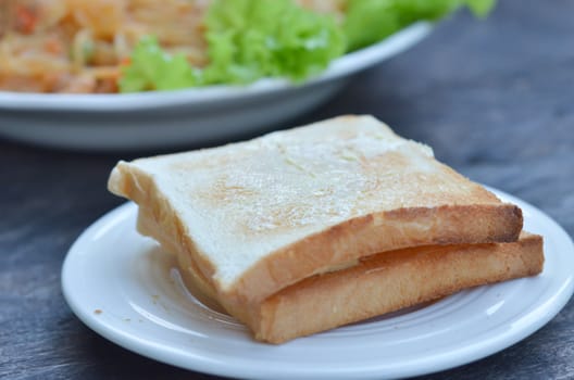 delicious twin  toast on white dish 
