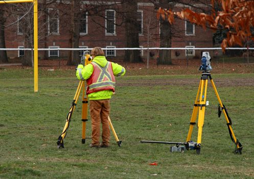 cartographer doing land survey for construction