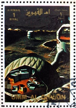 UMM AL-QUWAIN - CIRCA 1972: a stamp printed in the Umm al-Quwain shows Moon Base, Artist�s Vision, Moon Exploration, circa 1972