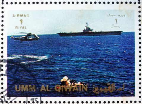 UMM AL-QUWAIN - CIRCA 1972: a stamp printed in the Umm al-Quwain shows Space Capsule Recovery, Apollo, Spaceflight Program, circa 1972