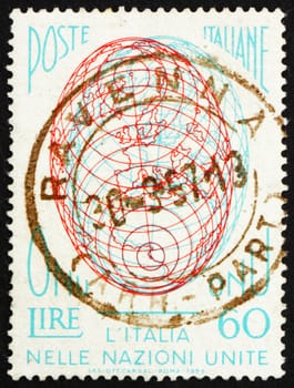 ITALY - CIRCA 1956: a stamp printed in the Italy shows Globe, Italy�s admission to the United Nations, circa 1956