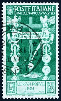 ITALY - CIRCA 1937: a stamp printed in the Italy shows Cross Roman Standards, 2000th Anniversary of the Birth of Emperor Augustus Caesar Octavianus, circa 1937