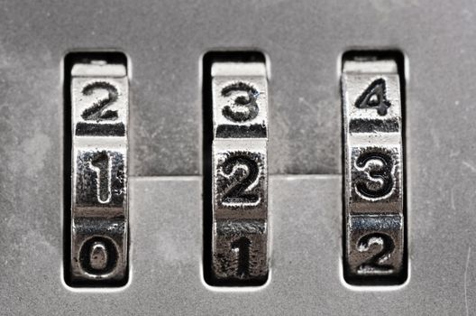 Macro of combination lock - dials set to 123,  Shallow DOF