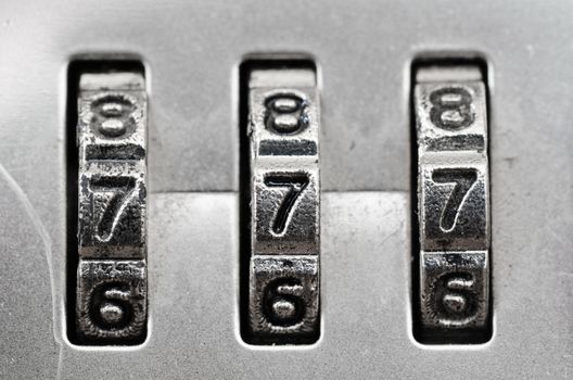 Macro of combination lock - dials set to 777, Shallow DOF