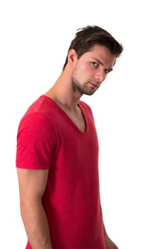 Young attractive single man looking seriously into camera