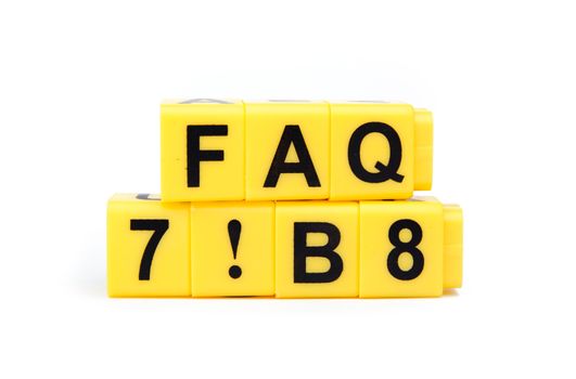 An image of yellow blocks with letters ''faq'' on them