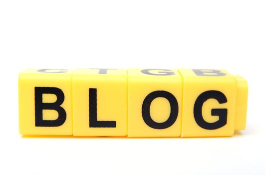 An image of yellow blocks with word ''blog'' on them
