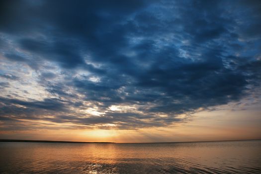 Beautiful seascape during sunset with cloudy dramatis sky