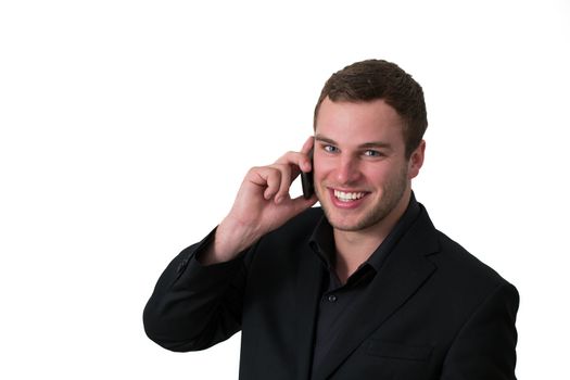Young Man in jacket talking on the phone and smiling