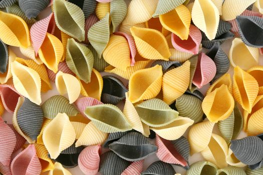 A background of variable colorfull pasta shells