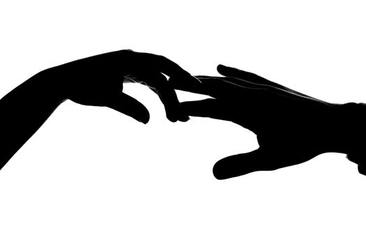 An image of silhouette of two hands. Man and woman.