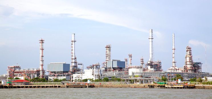 panorama landscape of Oil refinery plant along river