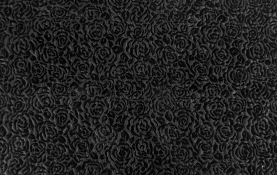 A background of a fabric with an abstract gray design.