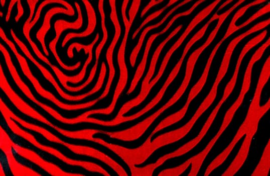 A background with an abstract design of red tiger stripes.