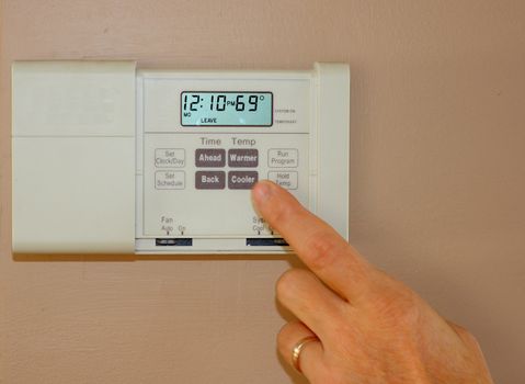 home thermostat to save on energy costs and conserve