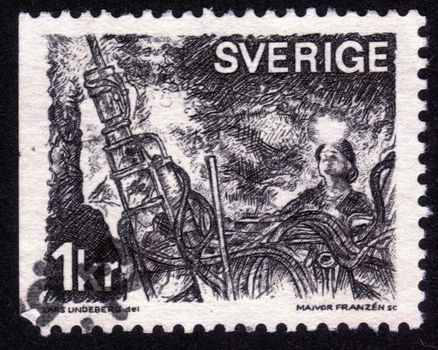 Sweden - CIRCA 1970: A stamp printed in the Sweden shows the working miners, circa 1970