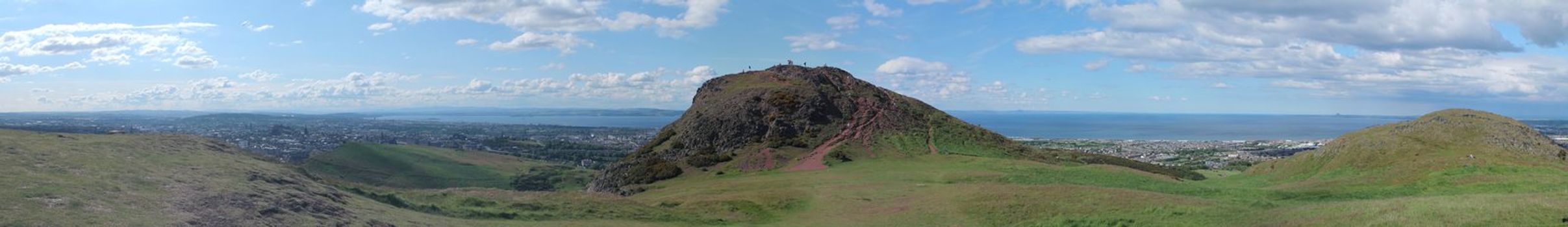 Panoramic photo of Arthur's Seat and Edinburgh, view from Arthur's Seat. This photo is made attaching together various photos.