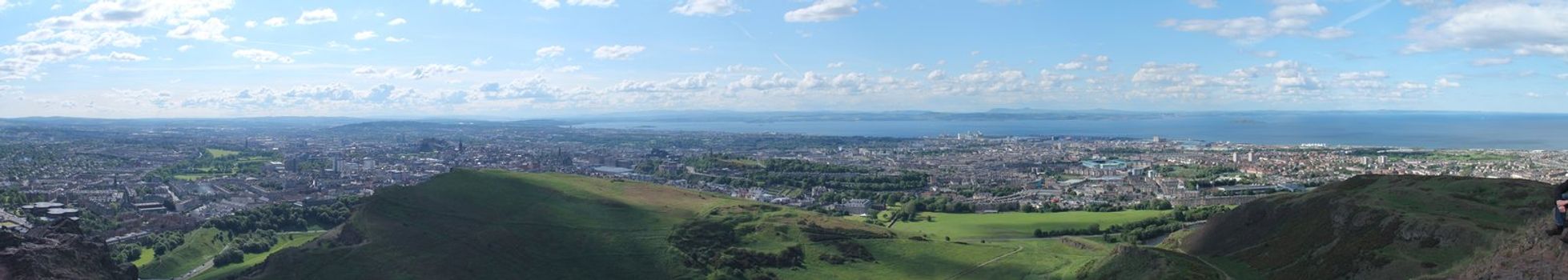 Panoramic photo of Edinburgh, view from Arthur's Seat. This photo is made attaching together various photos.