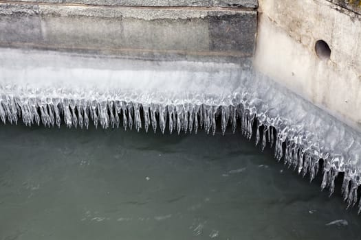 Heavy winter weather deposits ice on lakeside