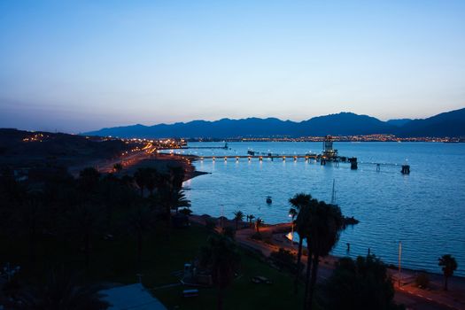 Beautiful night view over the bay of Eilat resort city Red Sea Israel