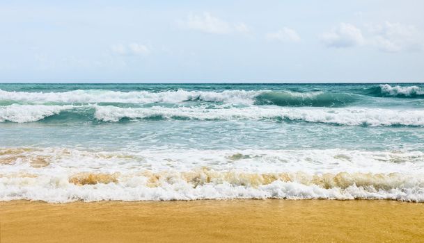 Azure tropical ocean waves on the beach