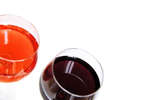 Red wine in glasses on a white background