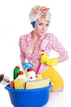 Coquettish pinup woman with cleaning set over white