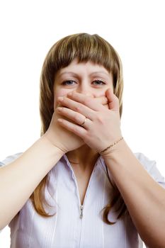 young girl covers her mouth with his hands on a white background