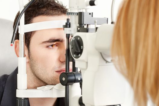 Male patient is having a medical attendance at the optometrist