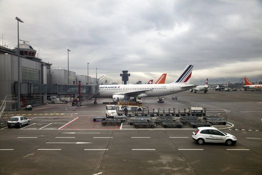 Airplanes at the Geneva airport tarmac.
Photo taken January 19, 2012 at Geneva International Airport, Geneva, Switzerland.