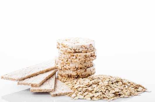 Various dietary oat products on wooden table