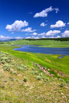 The Yellowstone River flows through Hayden Valley on a gorgeous summer day.