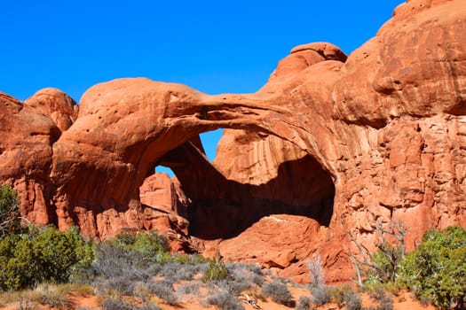 Double Arch spans the valley floor of Arches National Park in Utah.