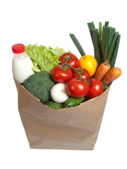 Bag full of vegetables, isolated on white