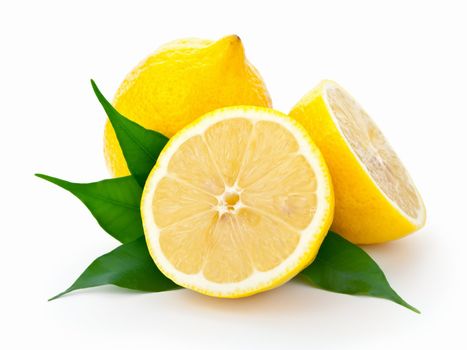 Fresh lemons with leaves on white background