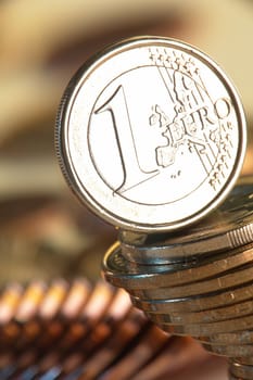 euro a coin on a background of coins                                                