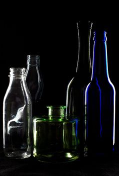 An image of silhouettes of bottles of wine