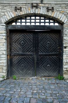 An image of iron door of a fortres