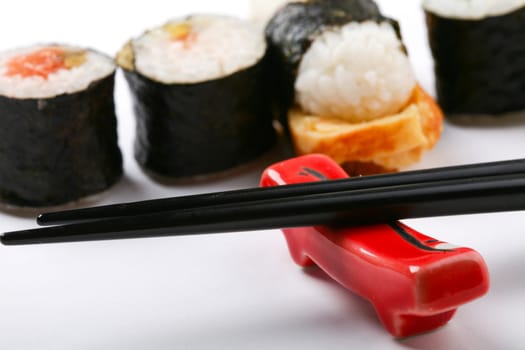 Stock Photo: Asia and food: prepared sushi on a plate