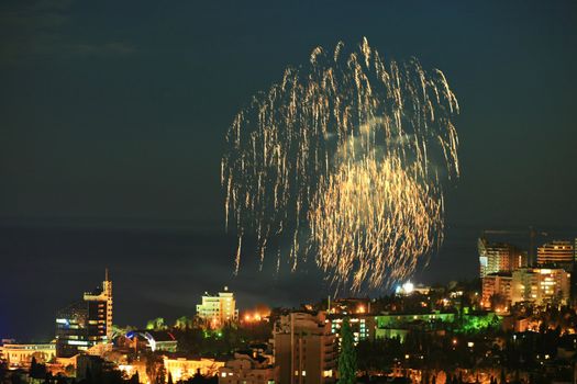 An image of fireworks over nightlife city