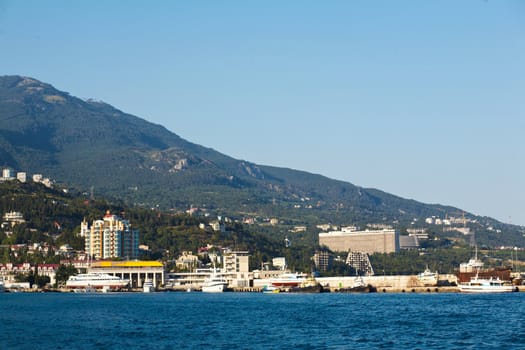 An image of residental building near sea